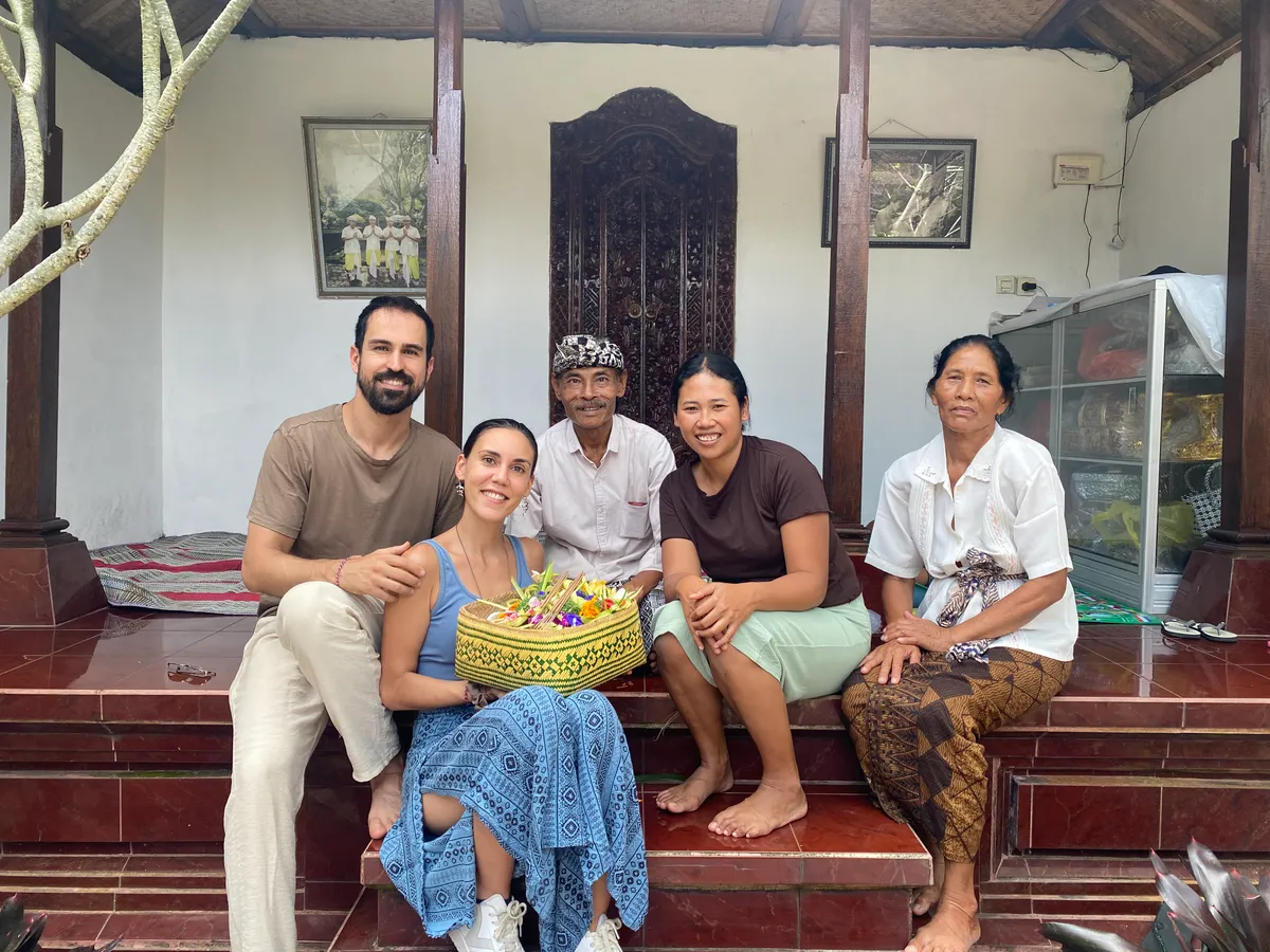Local Balinese guide explaining the meaning of each sacred spring