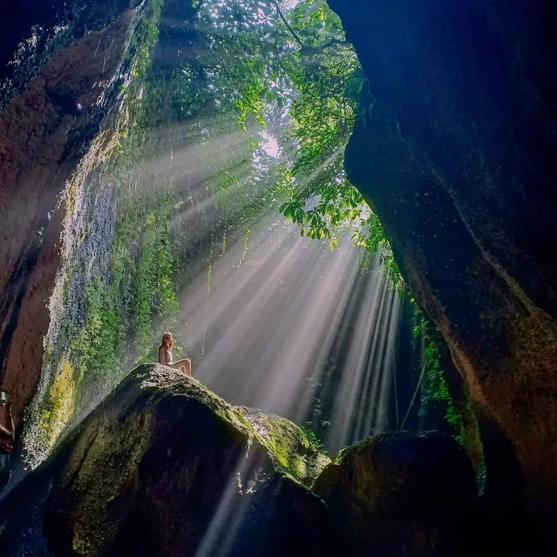 Tukad Cepung waterfall light beams