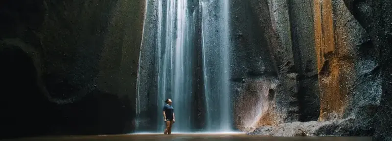 Tukad Cepung waterfall with light beams