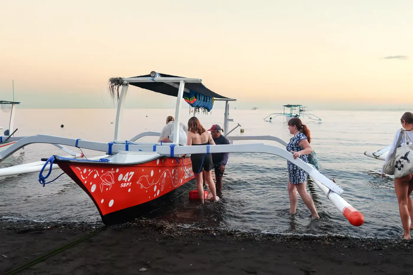 Wild dolphins and private boat in Lovina, Bali 3
